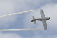 N661NA @ KMCF - A T-28 Trojan (N661NA) performs at MacDill Air Fest - by Jim Donten