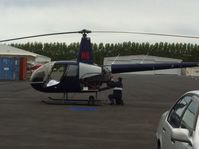 ZK-HHS @ NZAR - Being checked over at Heliflite - by magnaman