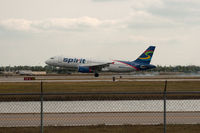 N606NK @ RSW - Spirit A320 touching down RWY 6