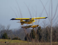 N422CC @ K62 - Here we see the Husky making a T & G at K62 airport on our water runway (just joking :) ) He just flew in, did a T & G and wandeed off to the Northwest toward CVG. We don't have a water runway. - by Charlie Pyles