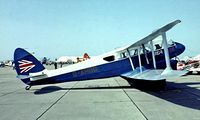 G-AHGD @ EG18 - De Havilland DH.89A Dragon Rapide [6862] RAF Bassingbourn 28/05/1978. Image taken from a slide. - by Ray Barber