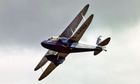 G-AHGD @ EG18 - De Havilland DH.89A Dragon Rapide [6862] RAF Bassingbourn 28/05/1978. Image taken from a slide. - by Ray Barber