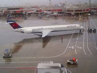 N932DN @ ATL - A rainy day at ATL - by Mike Mickey
