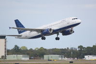 N554JB @ KSRQ - Jet Blue Air Bus A320 (N554JB) departs from Runway 14 at Sarasota-Bradenton International Airport enroute to John F Kennedy International Airport - by Jim Donten