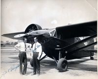 N796W @ UNKN - An autographed photo I have of Herndon and Pangborn standing in front of their airplane, NR796W.  Enlarging the photo reveals Bellanca 300 and NR796W on the tail.
 I also have a number of other photos of the plane. - by George E. Wilson