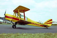 G-APAM @ EGTC - De Havilland DH.82A Thruxton Jackaroo [3874] Cranfield~G 03/07/1982. This was flown as a Thruxton Jackaroo from late 1959 to 1987 when it was converted back to a Tiger Moth. Image taken from a slide. - by Ray Barber
