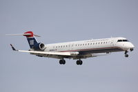 N909FJ @ KSRQ - US Air Flight 2675 operated by Mesa (N909FJ) arrives at Sarasota-Bradenton International Airport following a flight from Charlotte-Douglas International Airport - by Jim Donten