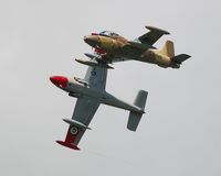 G-UVNR @ EGFH - Run and break led by G-VPER before G-UVNR lands at base. - by Roger Winser