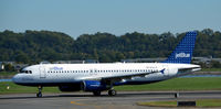 N656JB @ KDCA - Takeoff DCA - by Ronald Barker