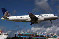 N401UA @ SXM - visitor - by Wolfgang Zilske