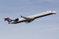 N919FJ @ KSRQ - US Air Flight 2678 operated by Mesa (N919FJ) departs Sarasota-Bradenton International Airport enroute to Charlotte-Douglas International Airport - by Jim Donten