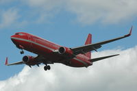 OY-SEJ @ ESSA - Nice red-liveried Boeing 737-800 operated by Sterling European Airlines approaching Stockholm Arlanda airport, Sweden. - by Henk van Capelle