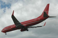 OY-SEJ @ ESSA - Nice red-liveried Boeing 737-800 operated by Sterling European Airlines approaching Stockholm Arlanda airport, Sweden. - by Henk van Capelle