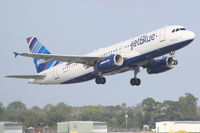 N526JL @ KSRQ - Jet Blue Airbus A320 (N526JL) departs from Runway 14 at Sarasota-Bradenton International Airport - by Jim Donten