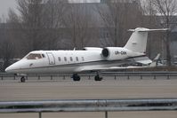 UR-CHH @ LOWW - Learjet 60