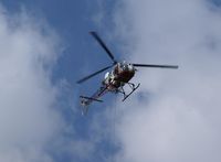 HB-XRF - Taken 2007 from Brienzer-Rothorn-Bahn -tourist train part way up the mountain, above Brienz, Switzerland.   Helicopter was delivering building materials to a farm site. - by Neil Henry