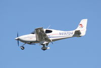 N497DA @ KSRQ - Cirrus SR-20 (N497DA) arrives at Sarasota-Bradenton International Airport following a flight from Orlando-Sanford International Airport - by Jim Donten