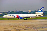 OH-LGA @ VTBD - McDonnell-Douglas MD-11 [48449] (Finnair) Bangkok~HS 12/11/2005. Taken through the glass of the terminal. - by Ray Barber