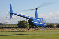 G-TBTB @ X5FB - Robinson R44 Raven. Fishburn Airfield UK, October 2012. - by Malcolm Clarke