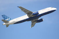 N706JB @ KSRQ - Jet Blue Flight 346 (N706JB) departs Runway 14 at Sarasota-Bradenton International Airport enroute to John F Kennedy International Airport - by Jim Donten