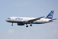 N784JB @ KSRQ - Jet Blue Airbus A320 (N784JB) on approach to Runway 32 at Sarasota-Bradenton International Airport - by Jim Donten