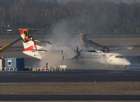 OE-LGG @ LOWW - Austrian Arrows DHC-8 - by Thomas Ranner