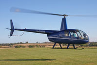 G-TBTB @ X5FB - Robinson R44 Raven. Fishburn Airfield UK, October 2012. - by Malcolm Clarke