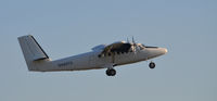 N469TS @ KOMH - Takeoff Orange - by Ronald Barker