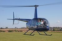 G-TBTB @ X5FB - Robinson R44 Raven, Fishburn Airfield UK, October 2012. - by Malcolm Clarke