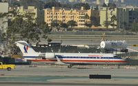 N464SW @ KLAX - Taxiing to gate - by Todd Royer