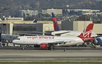 N628VA @ KLAX - Taxiing to gate - by Todd Royer