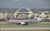 N322AA @ KLAX - Taxiing to gate - by Todd Royer