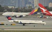 N633SK @ KLAX - Taxiing to gate - by Todd Royer