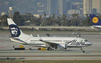 N613AS @ KLAX - Taxiing to gate - by Todd Royer