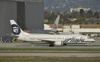 N796AS @ KLAX - Taxiing to gate - by Todd Royer
