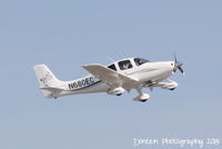N680EC @ KSRQ - Cirrus SR-20 (N680EC) departs Sarasota-Bradenton International Airport enroute to Orlando Executive Airport - by Donten Photography