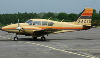 G-AZYU @ EGLK - Clourful PA-23 Aztec visiting Blackbushe on 9th May 2008 - by Michael J Duffield