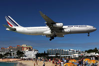 F-GNII @ SXM - Over famous Maho Beach - by Wolfgang Zilske