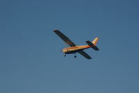N3060U @ 78Y - Departing Rankin Field to the North - by Floyd Taber