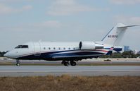 N335FX @ KFLL - CL604 of Bombardier Jet Solutions - by FerryPNL