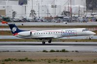 XA-JLI @ KLAX - Mexican ERJ145 touching down - by FerryPNL