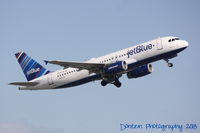 N583JB @ KSRQ - JetBlue Flight 346 Bluesville (N583JB) departs Sarasota-Bradenton International Airport enroute to John F Kennedy International Airport - by Donten Photography