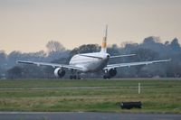 EC-HDK @ EGHH - Backtracking through the mist on 08 to depart after respray - by John Coates