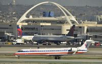 N507AE @ KLAX - Taxiing to gate - by Todd Royer