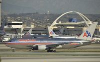 N323AA @ KLAX - Taxiing to gate - by Todd Royer