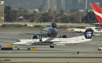 N432QX @ KLAX - Taxiing for departure - by Todd Royer