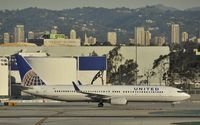 N31412 @ KLAX - Taxiing to gate - by Todd Royer