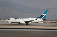 C-FZWS @ KLAS - Boeing 737-700 - by Mark Pasqualino