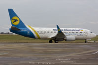 UR-GAQ @ EGSH - Being pulled to Air Livery hangar 3.