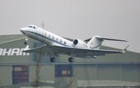 N113WJ @ EGHH - Departing after n/s - by John Coates